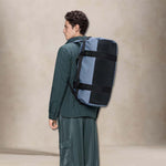 RAINS Texel Duffel Bag Small Blue Dusk